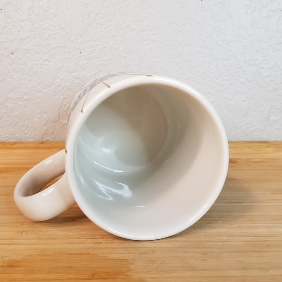 Cream Coffee Mug with "There's No Place Like Home" by Designs by Kathy - Picture 2 of 6